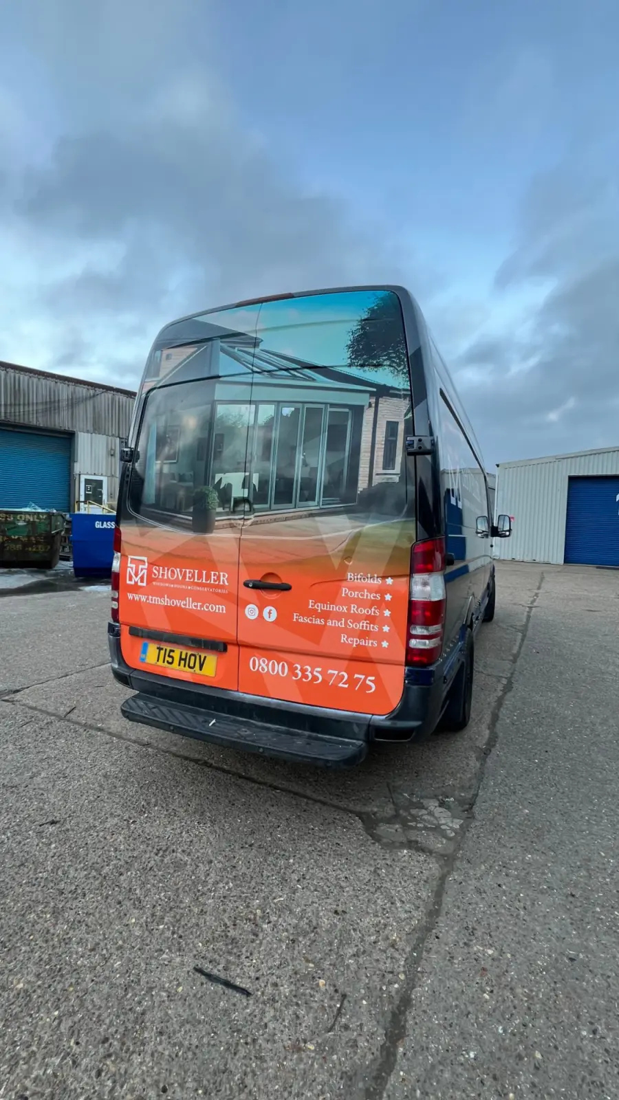 Rear of the finished TM Shoveller van parked outdoors